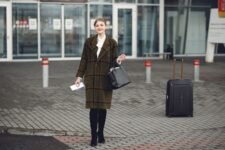 Bluetooth tracker on passport with luggage
